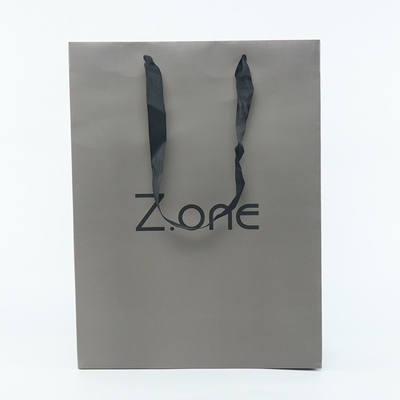 Fördermaschinen-Art Kraft Coated Paper Shopping-Tasche für Kleidungs-Kleidergeschenk