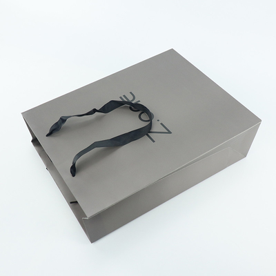 Fördermaschinen-Art Kraft Coated Paper Shopping-Tasche für Kleidungs-Kleidergeschenk