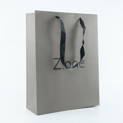 Fördermaschinen-Art Kraft Coated Paper Shopping-Tasche für Kleidungs-Kleidergeschenk